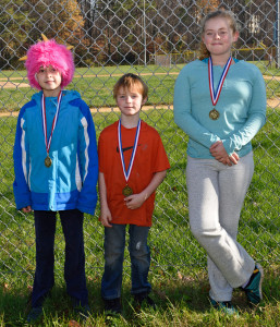 KIds show off their Gobble Wobble medals