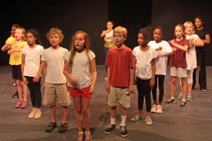 Campers sing "Take a tumble for love."  Photo by Jon Gardner