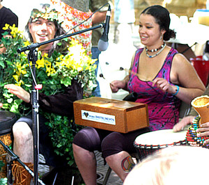 Dorian Winterfeld and Vanessa Harris enjoy the drum circle, photo by Michael Reinsel