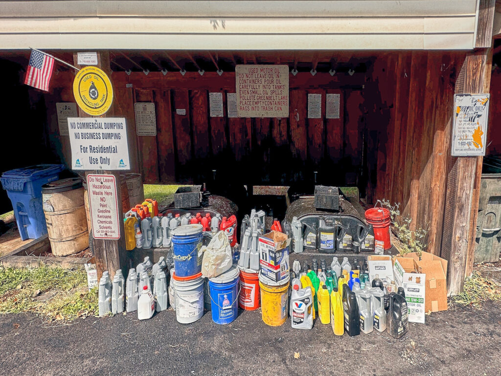 Overflowing used oil section at the recycling center